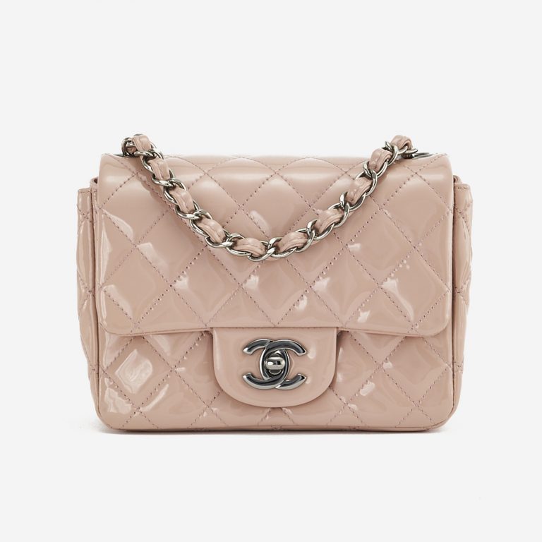 A pre-loved Chanel Timeless Mini Square in Nude Patent Leather on SACLÀB