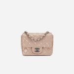 A pre-loved Chanel Timeless Mini Square in Nude Patent Leather on SACLÀB