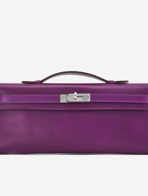 A pre-loved Hermès Kelly Cut Clutch in Anemone Swift Leather on SACLÀB