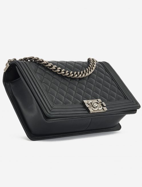 A pre-loved Chanel Boy Medium Lambskin Black on SACLÀB