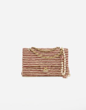 A limited-edition Chanel Timeless Medium made from Fabric and Pearls in Red and White on SACLÀB