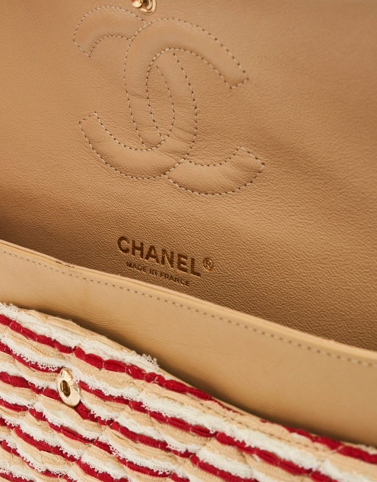 A limited-edition Chanel Timeless Medium made from Fabric and Pearls in Red and White on SACLÀB