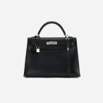 A pre-loved Hermès Kelly 32 Box Leather in Black on SACLÀB