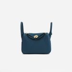 A pre-loved Hermès Lindy Mini Clemence Vert Bosphore on SACLÀB