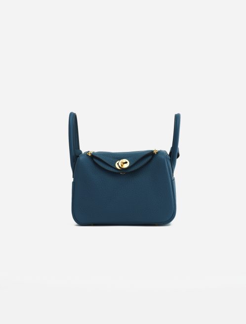 A pre-loved Hermès Lindy Mini Clemence Vert Bosphore on SACLÀB