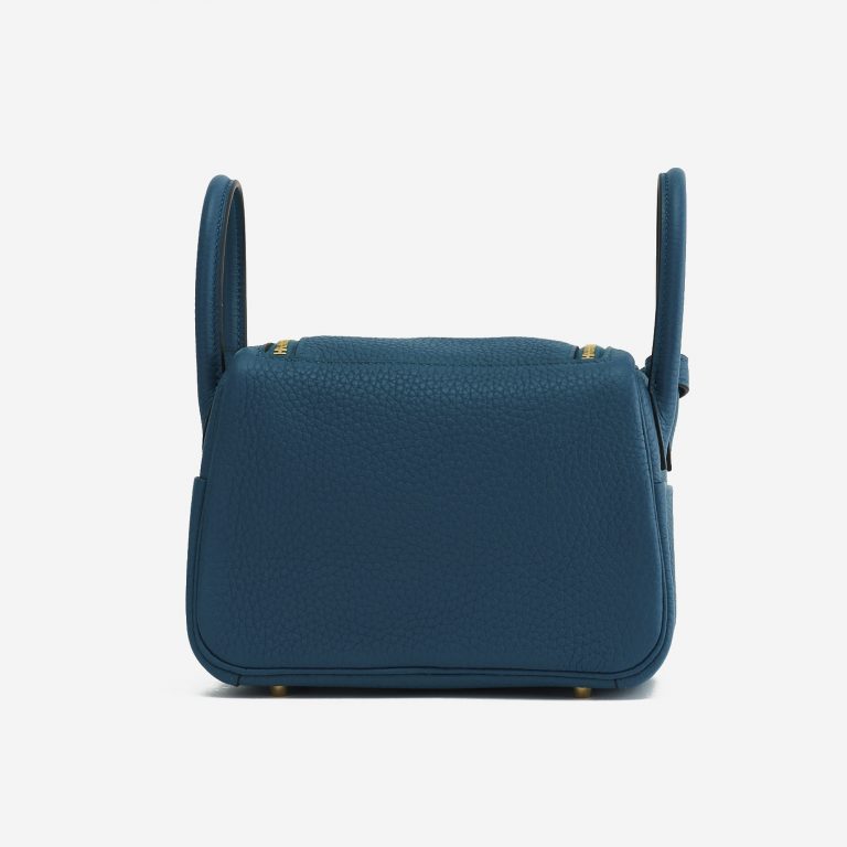 A pre-loved Hermès Lindy Mini Clemence Vert Bosphore on SACLÀB