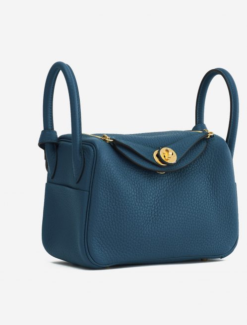A pre-loved Hermès Lindy Mini Clemence Vert Bosphore on SACLÀB