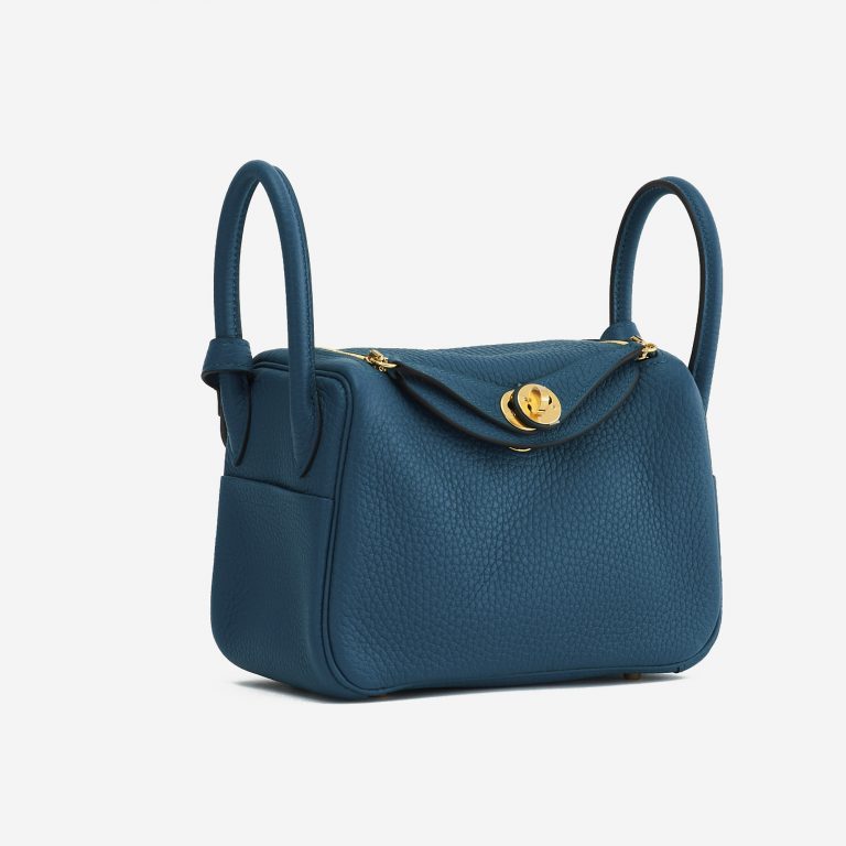 A pre-loved Hermès Lindy Mini Clemence Vert Bosphore on SACLÀB