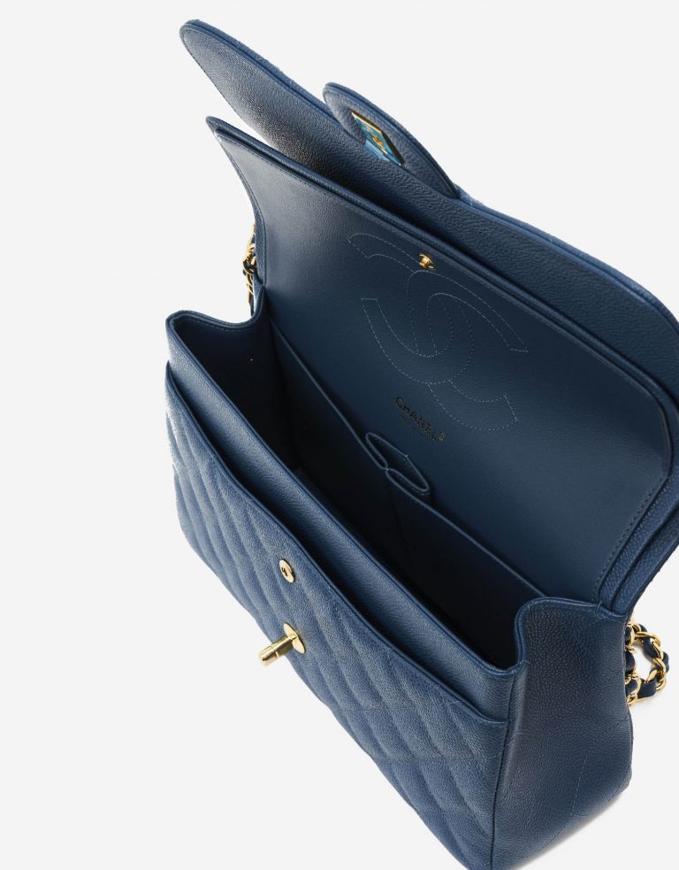 A pre-loved Chanel Timeless Jumbo Caviar Blue on SACLÀB