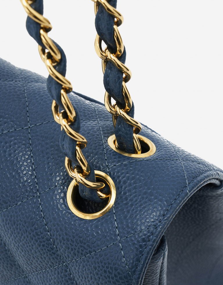 A pre-loved Chanel Timeless Jumbo Caviar Blue on SACLÀB
