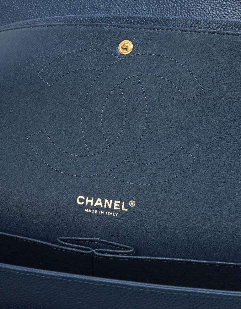 A pre-loved Chanel Timeless Jumbo Caviar Blue on SACLÀB