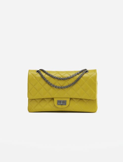 A pre-loved Chanel 2.55 Reissue 227 Patent Caviar Yellow on SACLÀB