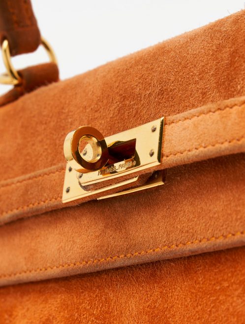 A pre-loved Hermès Kelly 25 Doblis Orange H on SACLÀB