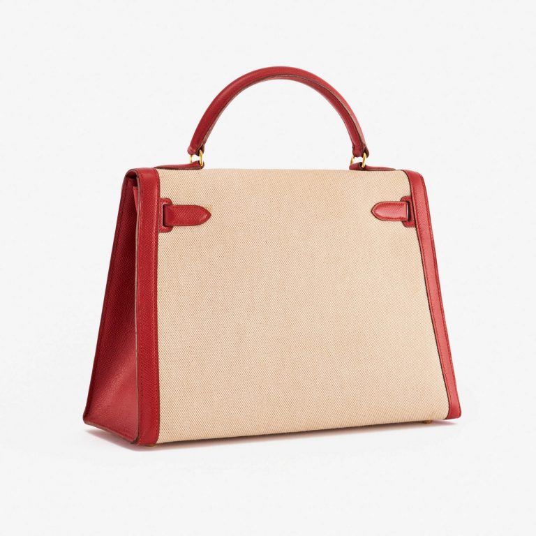 Pre-owned Hermès bag Kelly 32 Courchevel / Toile Rouge Vif / Toile Beige, Red | Sell your designer bag on Saclab.com