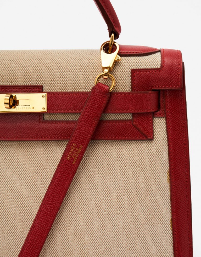 Pre-owned Hermès bag Kelly 32 Courchevel / Toile Rouge Vif / Toile Beige, Red | Sell your designer bag on Saclab.com