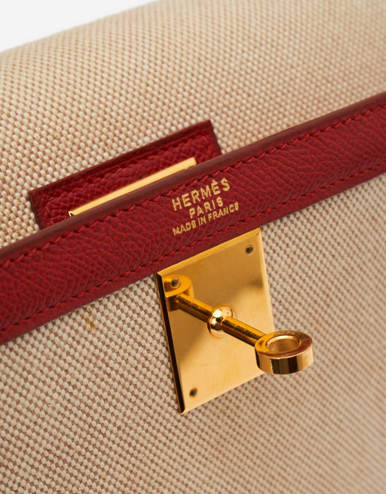 Pre-owned Hermès bag Kelly 32 Courchevel / Toile Rouge Vif / Toile Beige, Red | Sell your designer bag on Saclab.com