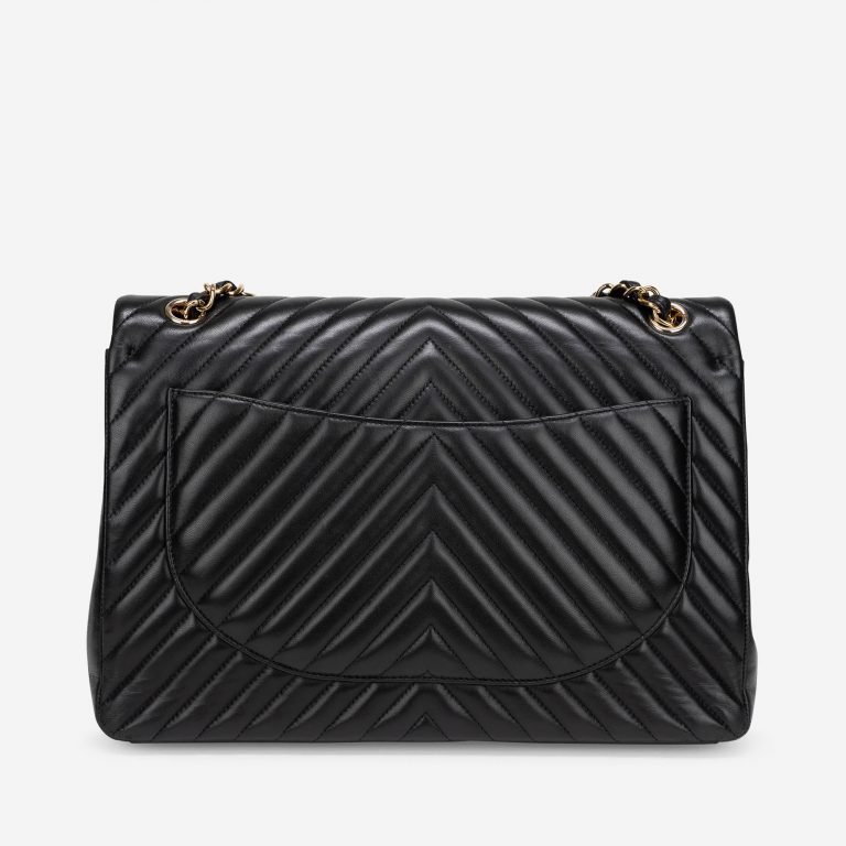 Pre-owned Chanel bag Timeless Maxi Lamb Chevron Black Black | Sell your designer bag on Saclab.com