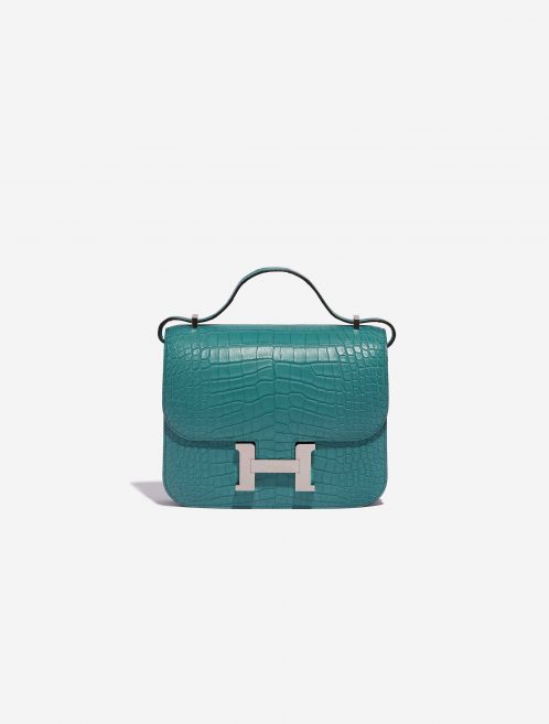 An exotic Hermès Constance 18 designed for seamless day-to-night dressing. It has been handcrafted from exquisite, matte alligator leather in Blue Paron topped with palladium-plated hardware. Produced in 2020 (“Y” stamp), it arrives in immaculate unworn condition. Make it the jewel in your bag collection.