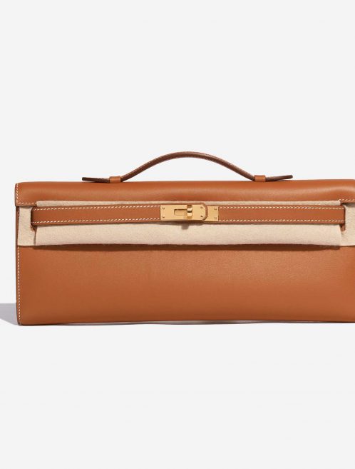 Pre-owned Hermès bag Kelly Cut Clutch Swift Gold Beige, Brown Front Velt | Sell your designer bag on Saclab.com