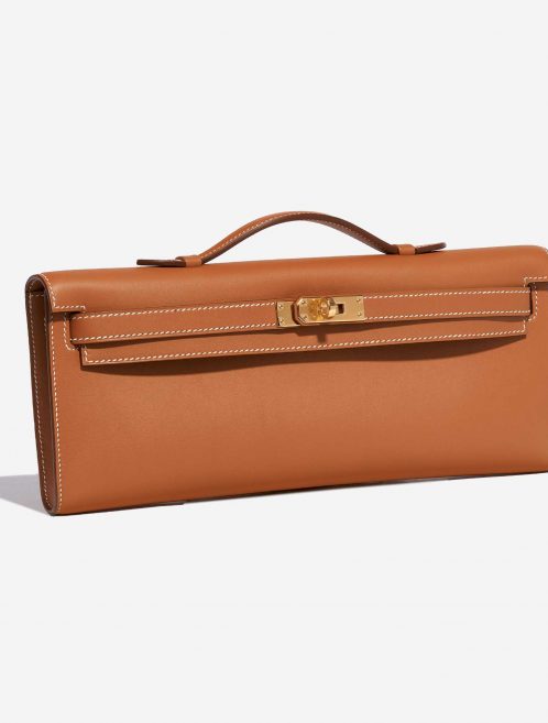 Pre-owned Hermès bag Kelly Cut Clutch Swift Gold Beige, Brown Side Front | Sell your designer bag on Saclab.com