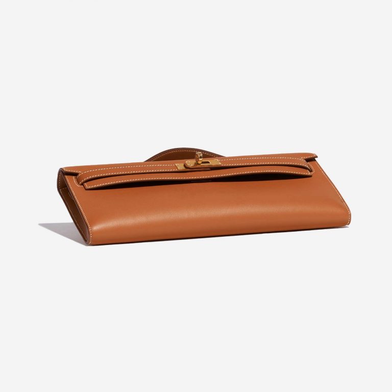 Pre-owned Hermès bag Kelly Cut Clutch Swift Gold Beige, Brown Bottom | Sell your designer bag on Saclab.com