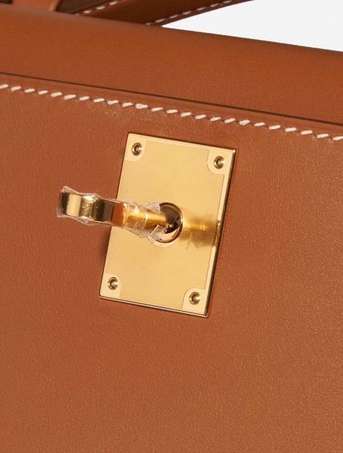 Pre-owned Hermès bag Kelly Cut Clutch Swift Gold Beige, Brown Detail | Sell your designer bag on Saclab.com