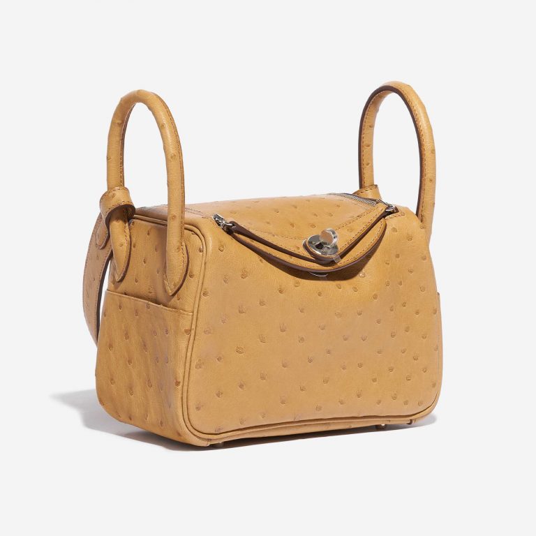 Pre-owned Hermès bag Lindy 20 Mini Ostrich Tabac Camel Yellow Side Front | Sell your designer bag on Saclab.com