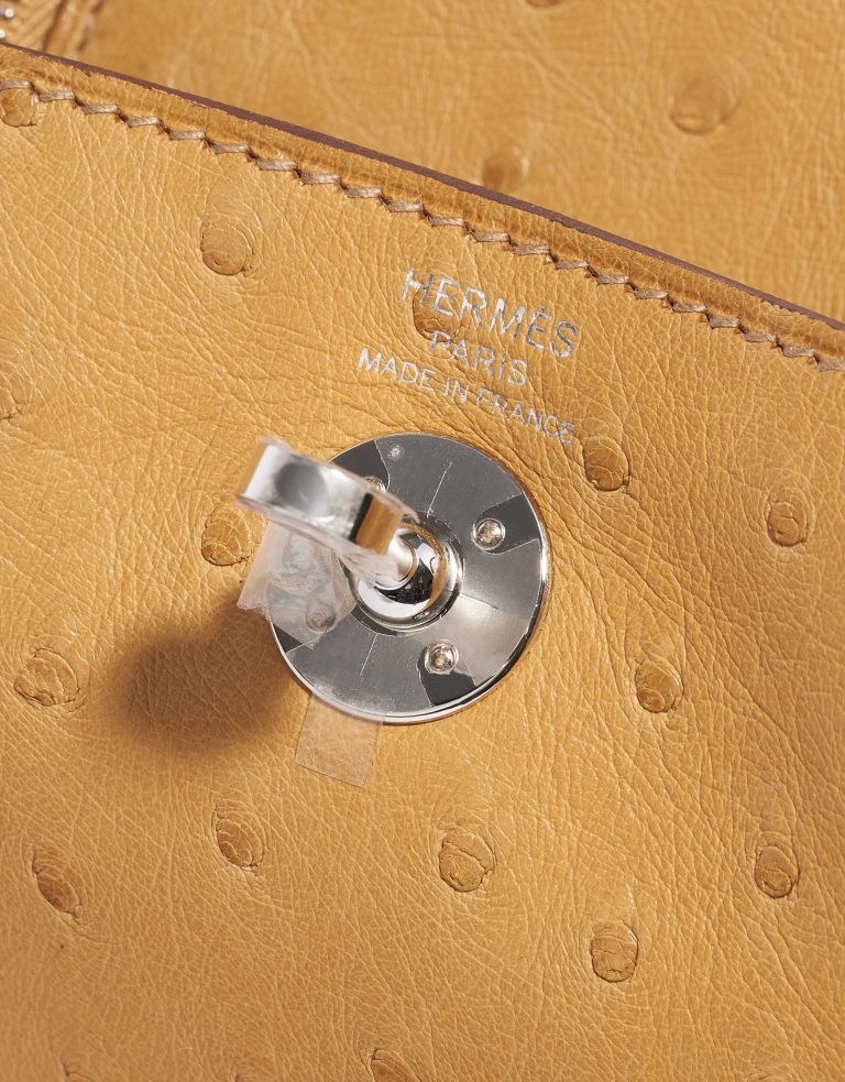 Pre-owned Hermès bag Lindy 20 Mini Ostrich Tabac Camel Yellow Closing System | Sell your designer bag on Saclab.com