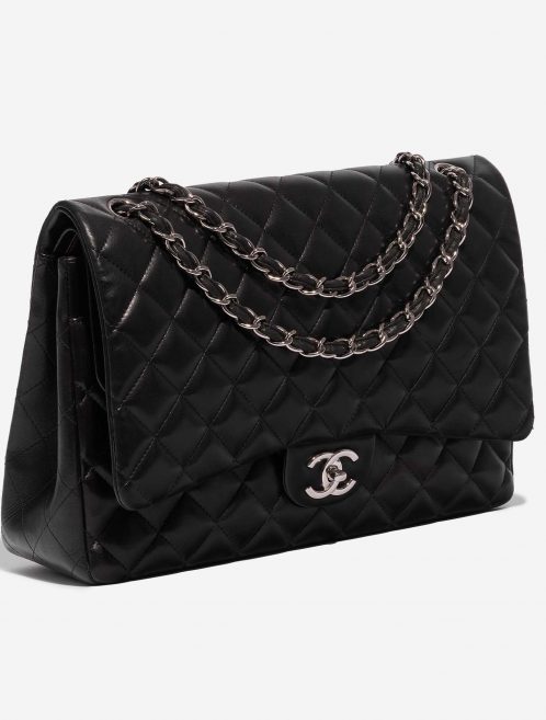 Pre-owned Chanel bag Timeless Maxi Lamb Black Black Side Front | Sell your designer bag on Saclab.com