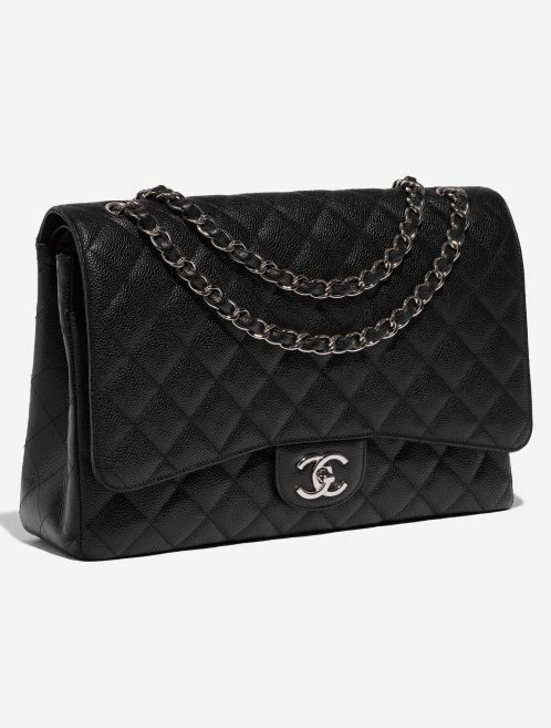 Pre-owned Chanel bag Timeless Maxi Caviar Black Black Side Front | Sell your designer bag on Saclab.com
