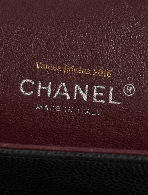 Pre-owned Chanel bag Timeless Maxi Caviar Black Black Logo | Sell your designer bag on Saclab.com