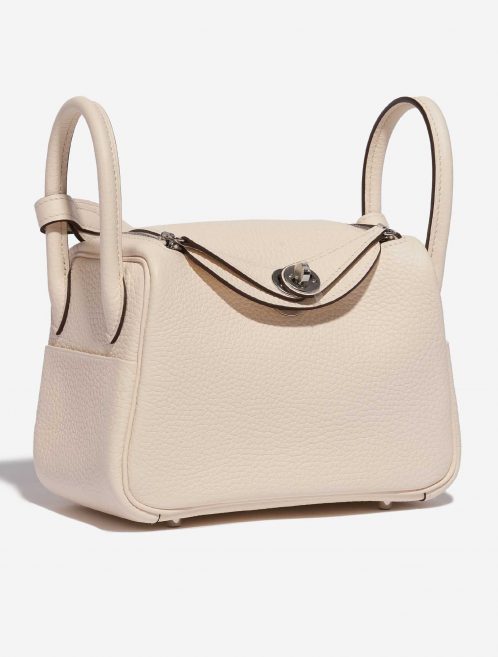 Pre-owned Hermès bag Lindy Mini Clemence Nata Beige, White Side Front | Sell your designer bag on Saclab.com