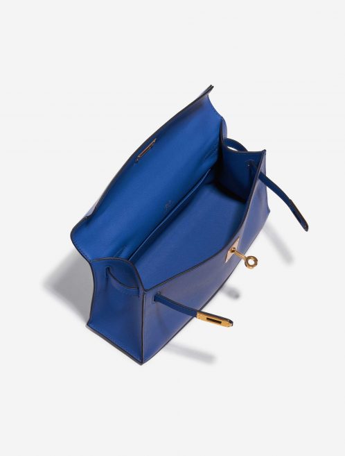 Pre-owned Hermès bag Kelly Pochette Swift Blue de France Blue Inside | Sell your designer bag on Saclab.com