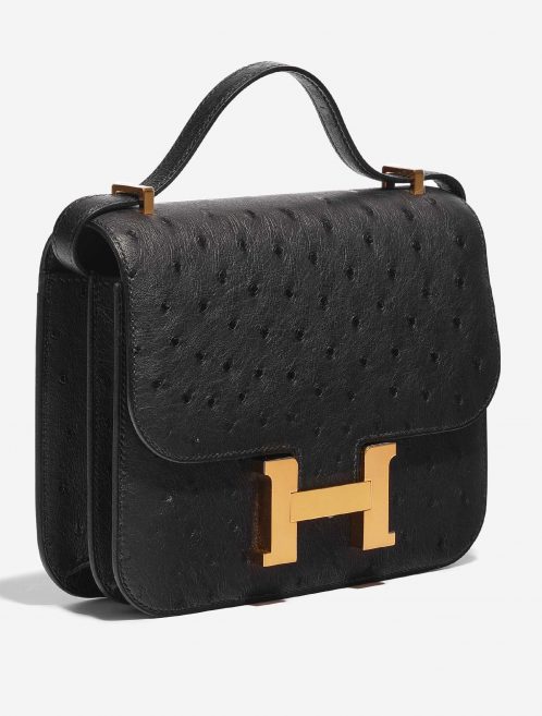 Pre-owned Hermès bag Constance 18 Ostrich Black Black Side Front | Sell your designer bag on Saclab.com