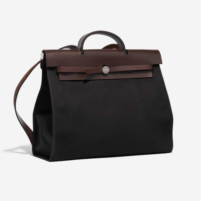 Pre-owned Hermès bag Herbag 39 Toile / Vache Hunter Black / Chocolate Black, Brown Side Front | Sell your designer bag on Saclab.com