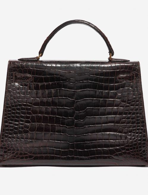 Pre-owned Hermès bag Kelly 32 Porosus Crocodile Dark Brown Brown Back | Sell your designer bag on Saclab.com