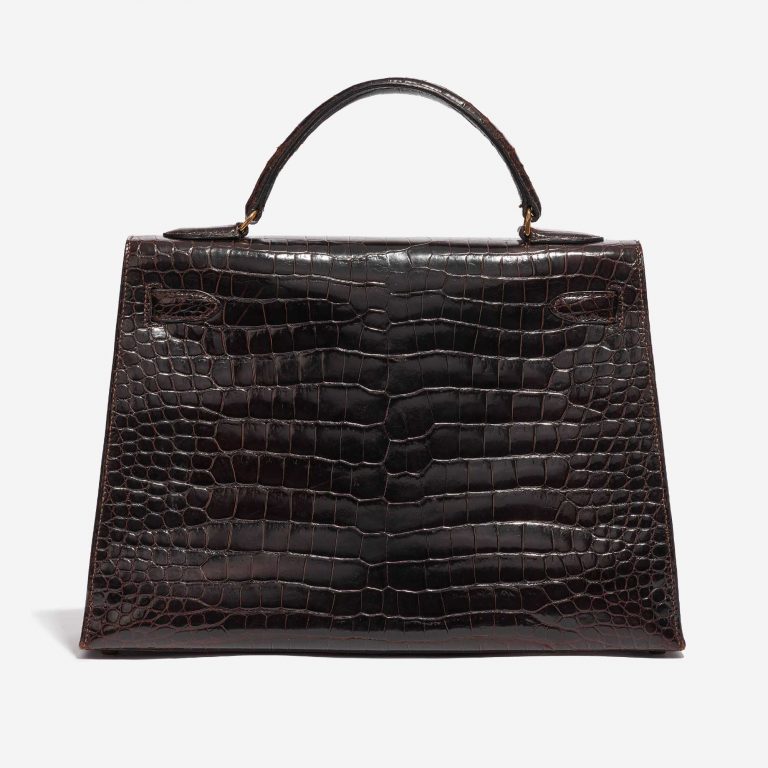 Pre-owned Hermès bag Kelly 32 Porosus Crocodile Dark Brown Brown Back | Sell your designer bag on Saclab.com