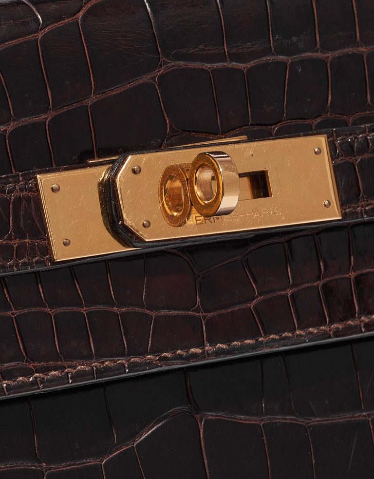 Pre-owned Hermès bag Kelly 32 Porosus Crocodile Dark Brown Brown Closing System | Sell your designer bag on Saclab.com