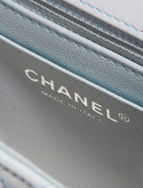 Pre-owned Chanel bag Timeless Square Mini Lamb Blue Iridescent Blue Logo | Sell your designer bag on Saclab.com