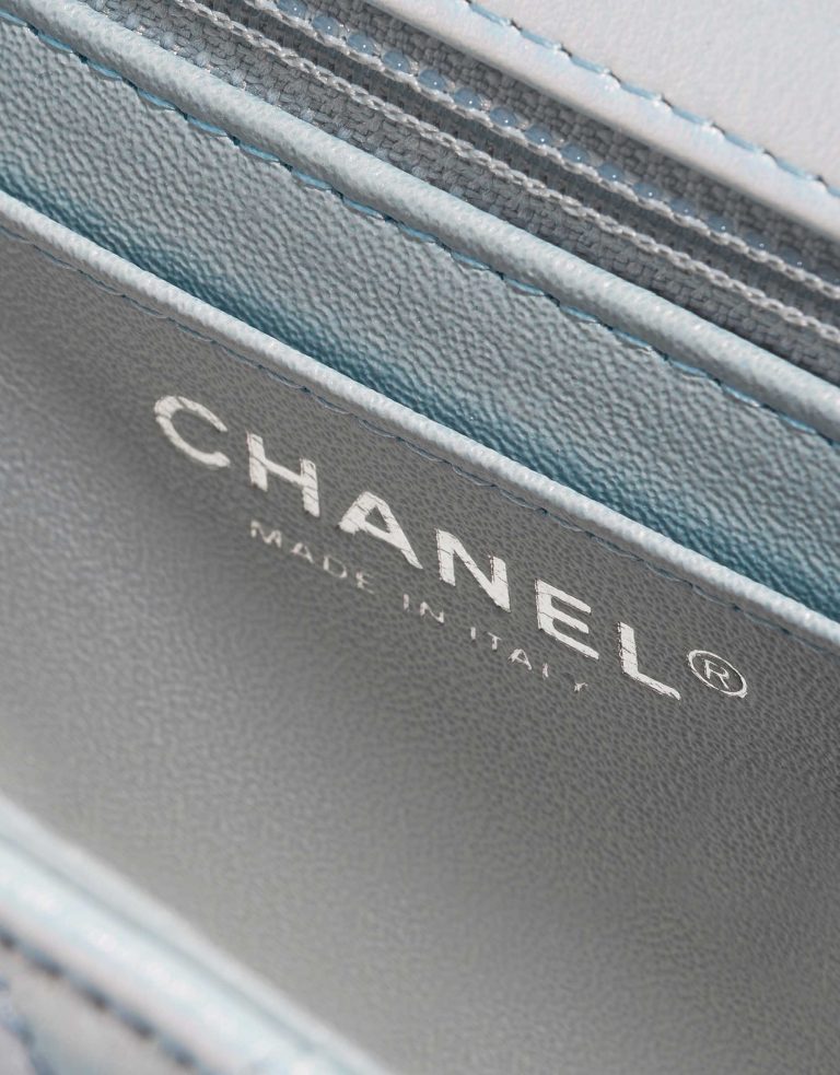 Pre-owned Chanel bag Timeless Square Mini Lamb Blue Iridescent Blue Logo | Sell your designer bag on Saclab.com