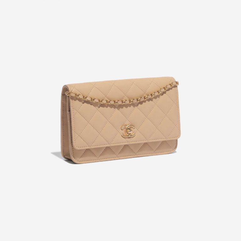 Pre-owned Chanel bag Timeless WOC Lamb Beige Beige, Brown Side Front | Sell your designer bag on Saclab.com