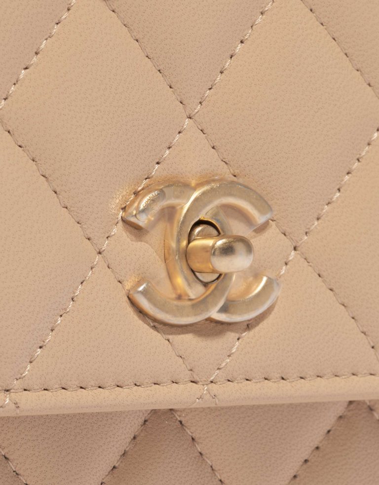 Pre-owned Chanel bag Timeless WOC Lamb Beige Beige, Brown Closing System | Sell your designer bag on Saclab.com