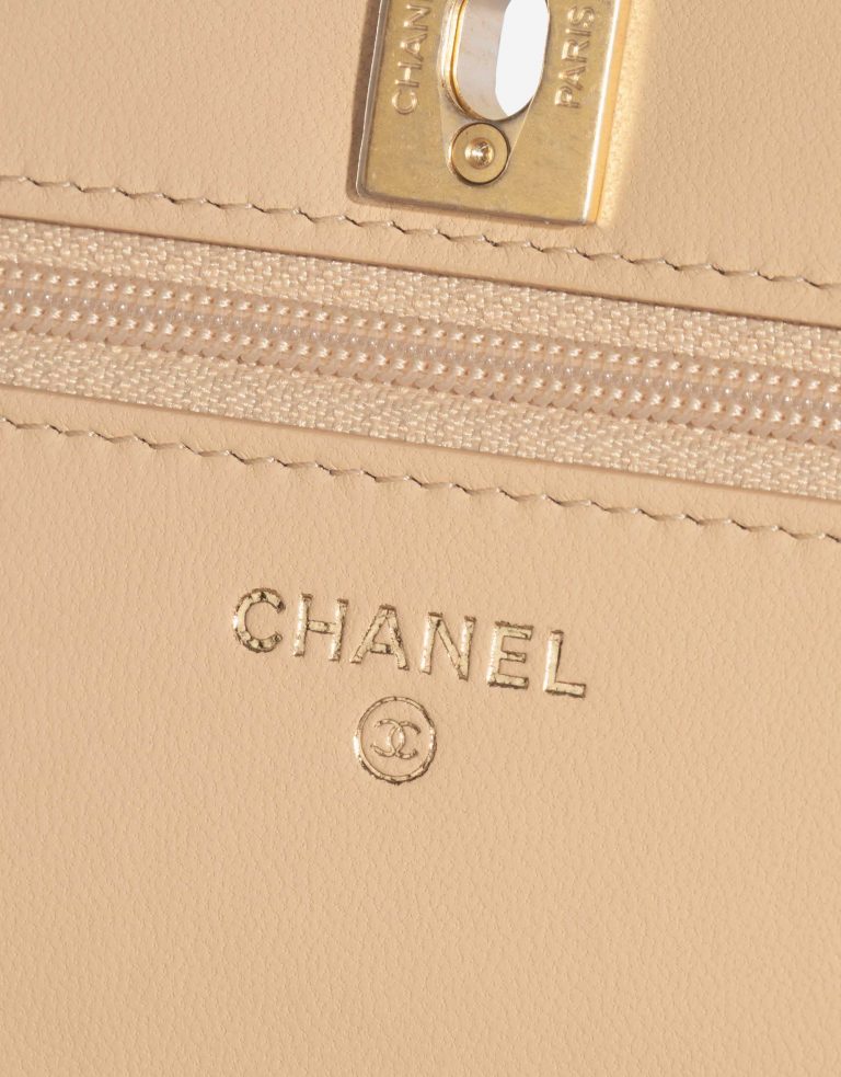 Pre-owned Chanel bag Timeless WOC Lamb Beige Beige, Brown Logo | Sell your designer bag on Saclab.com