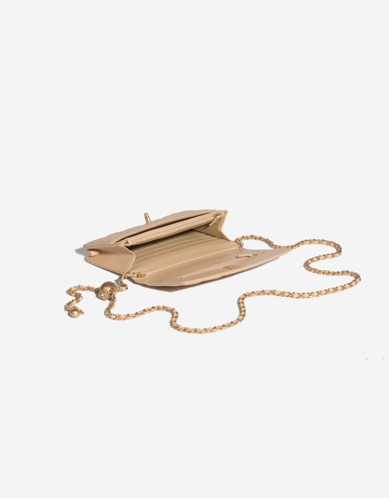 Pre-owned Chanel bag Timeless WOC Lamb Beige Beige, Brown Inside | Sell your designer bag on Saclab.com
