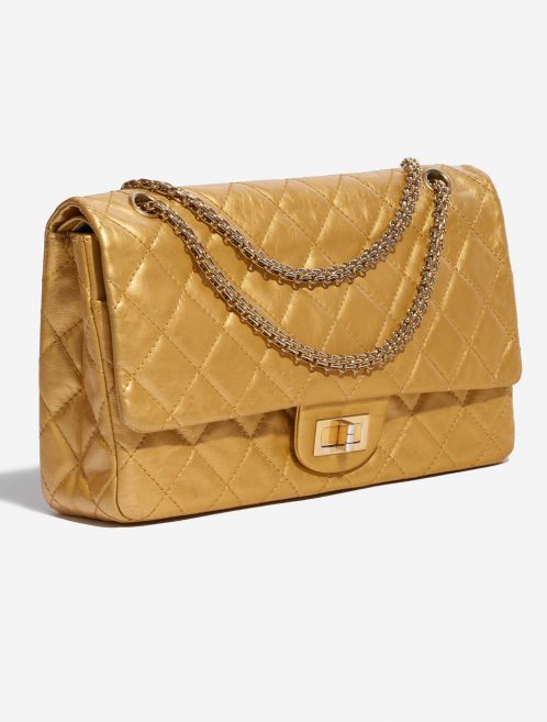 Pre-owned Chanel bag 2.55 Reissue 227 Lamb Gold Gold Side Front | Sell your designer bag on Saclab.com
