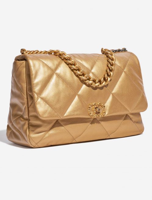 Pre-owned Chanel bag 19 Flap Bag Maxi Lamb Gold Gold Side Front | Sell your designer bag on Saclab.com