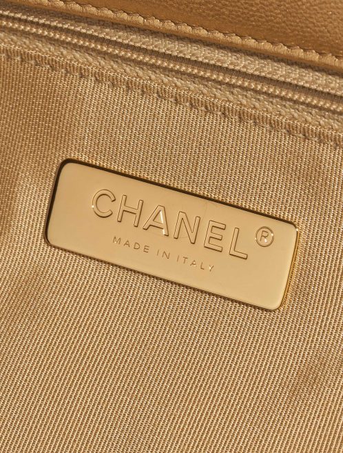 Pre-owned Chanel bag 19 Flap Bag Maxi Lamb Gold Gold Logo | Sell your designer bag on Saclab.com