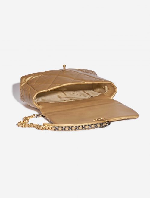Pre-owned Chanel bag 19 Flap Bag Maxi Lamb Gold Gold Inside | Sell your designer bag on Saclab.com