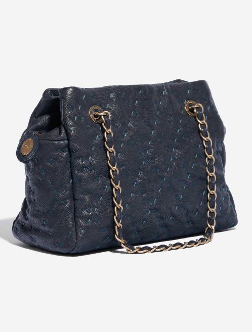 Pre-owned Chanel bag Shopping Tote PST Caviar Dark Blue Blue Side Front | Sell your designer bag on Saclab.com