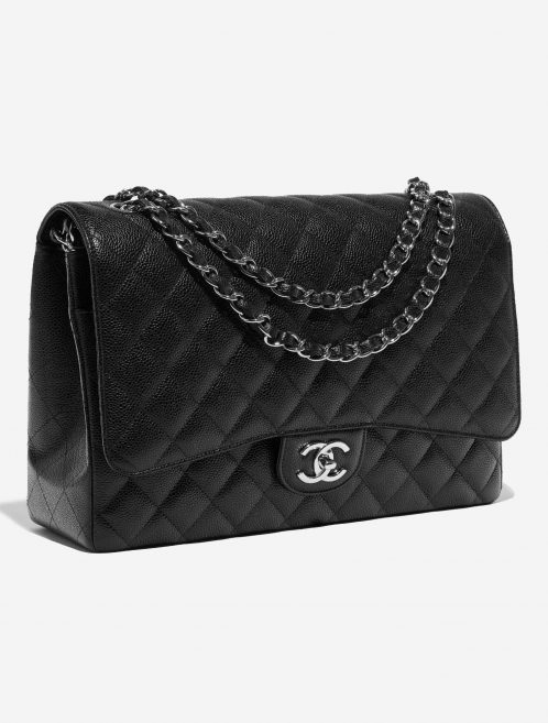 Pre-owned Chanel bag Timeless Maxi Caviar Black Black Side Front | Sell your designer bag on Saclab.com